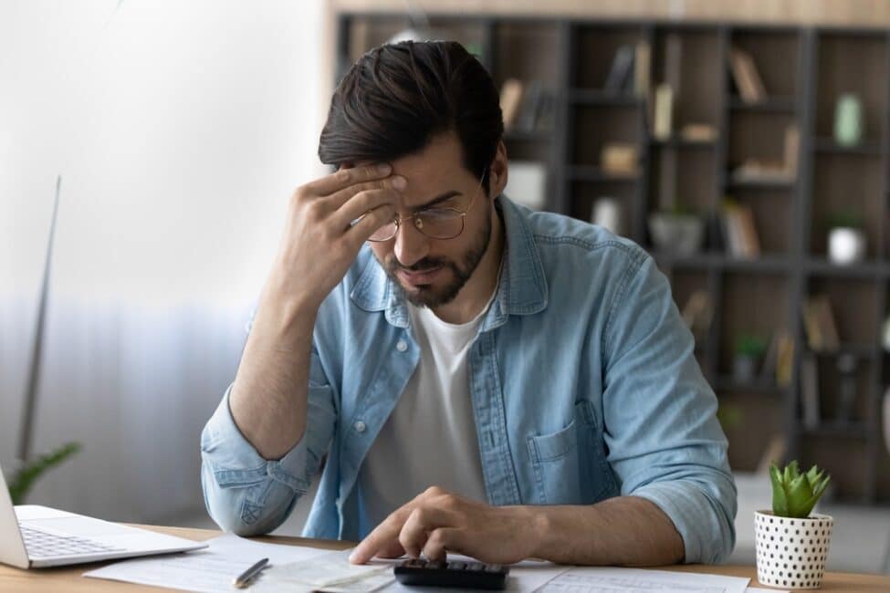 A stressed man due to tax debt