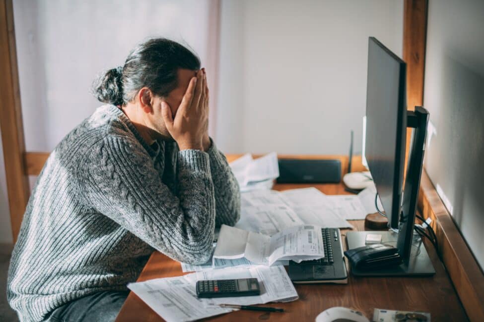 Stressed man because they need help with rent payments